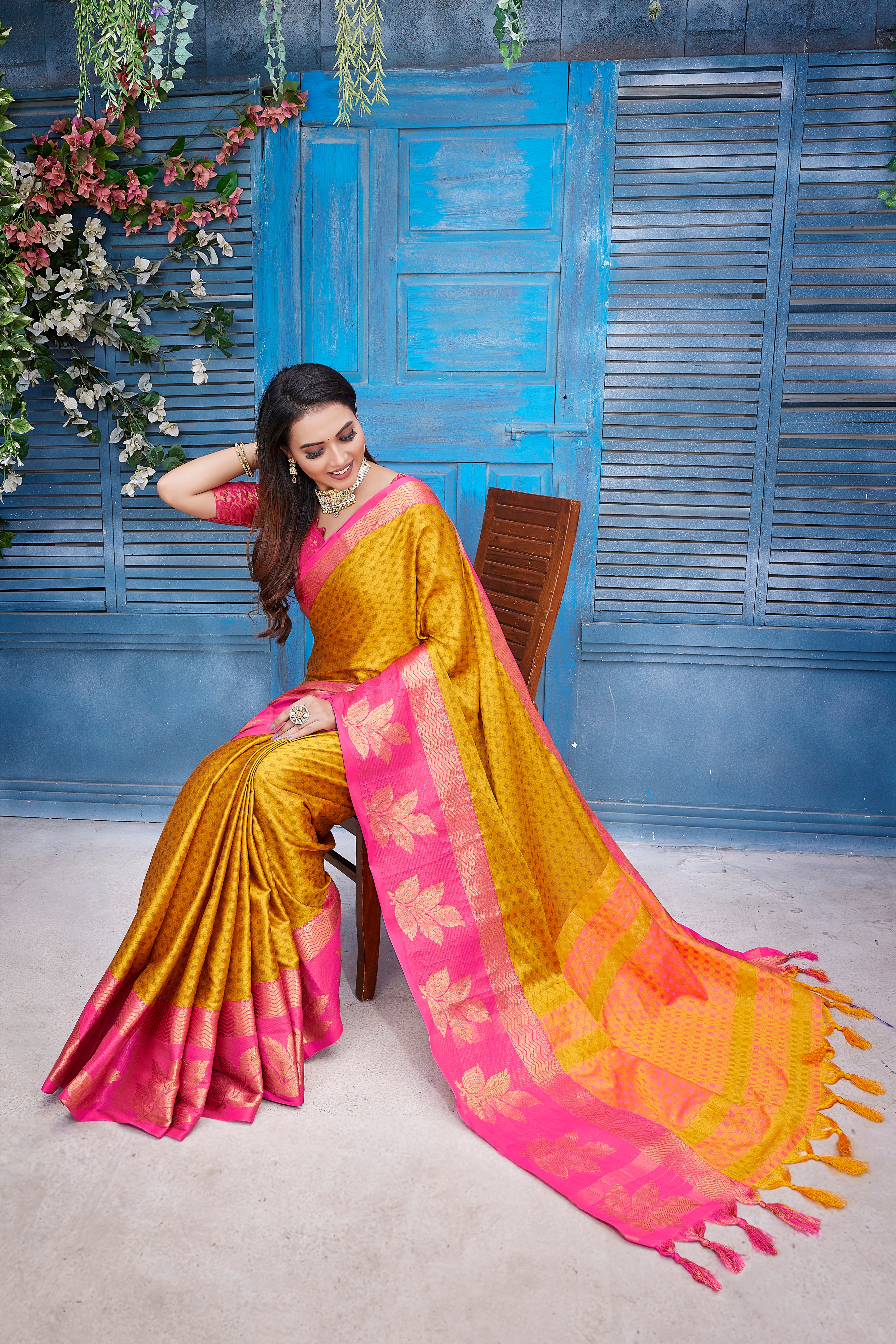Stylish Looking Yellow Color Aura Silk Saree