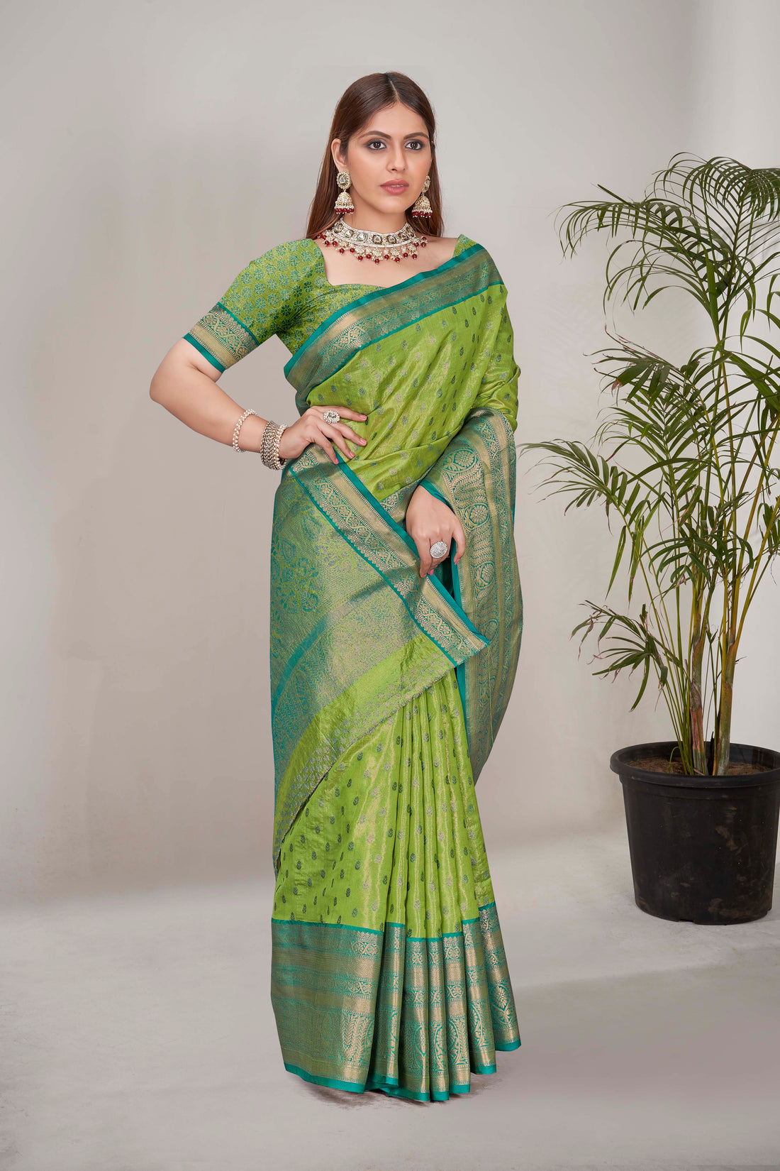 Stunning Tissue Silk Green Color Saree