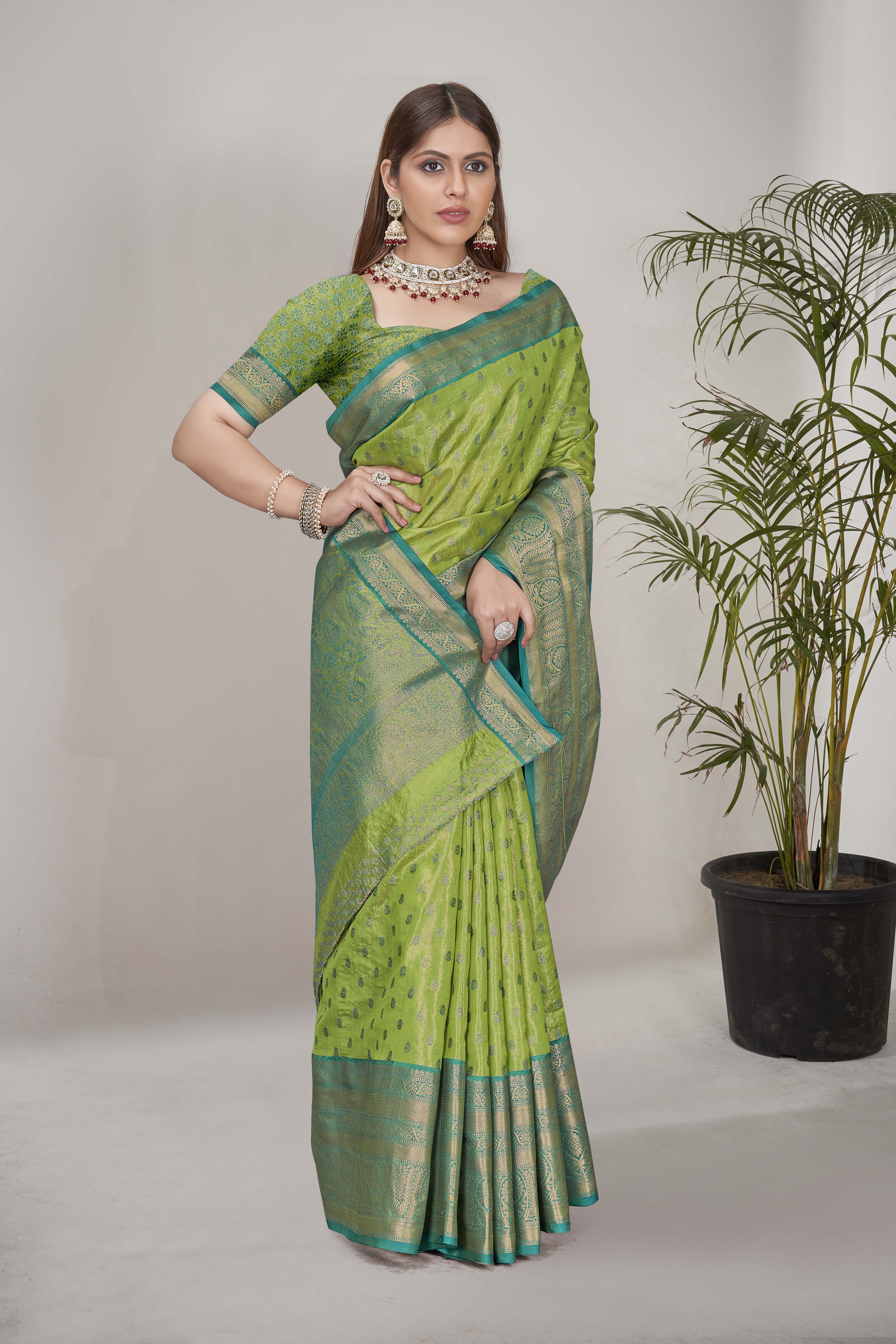 Stunning Tissue Silk Green Color Saree