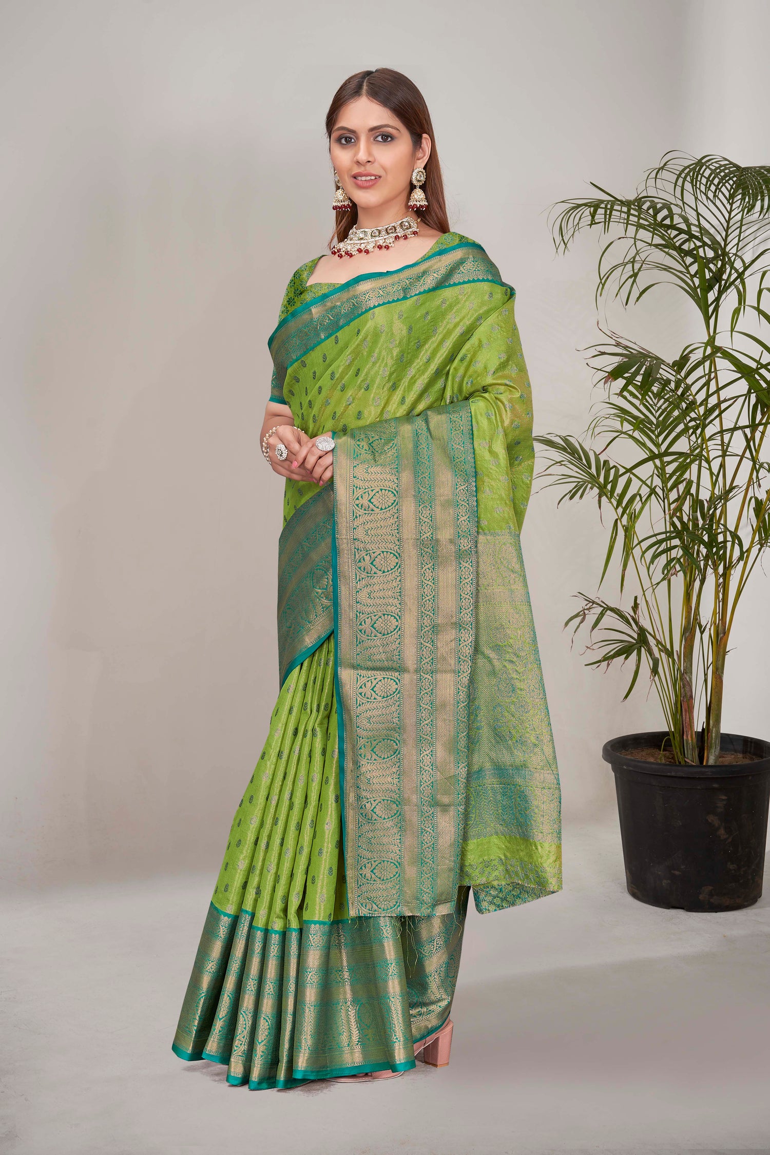 Stunning Tissue Silk Green Color Saree