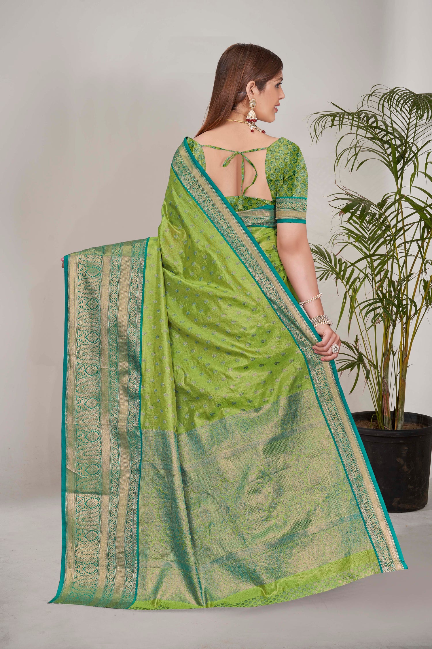 Stunning Tissue Silk Green Color Saree