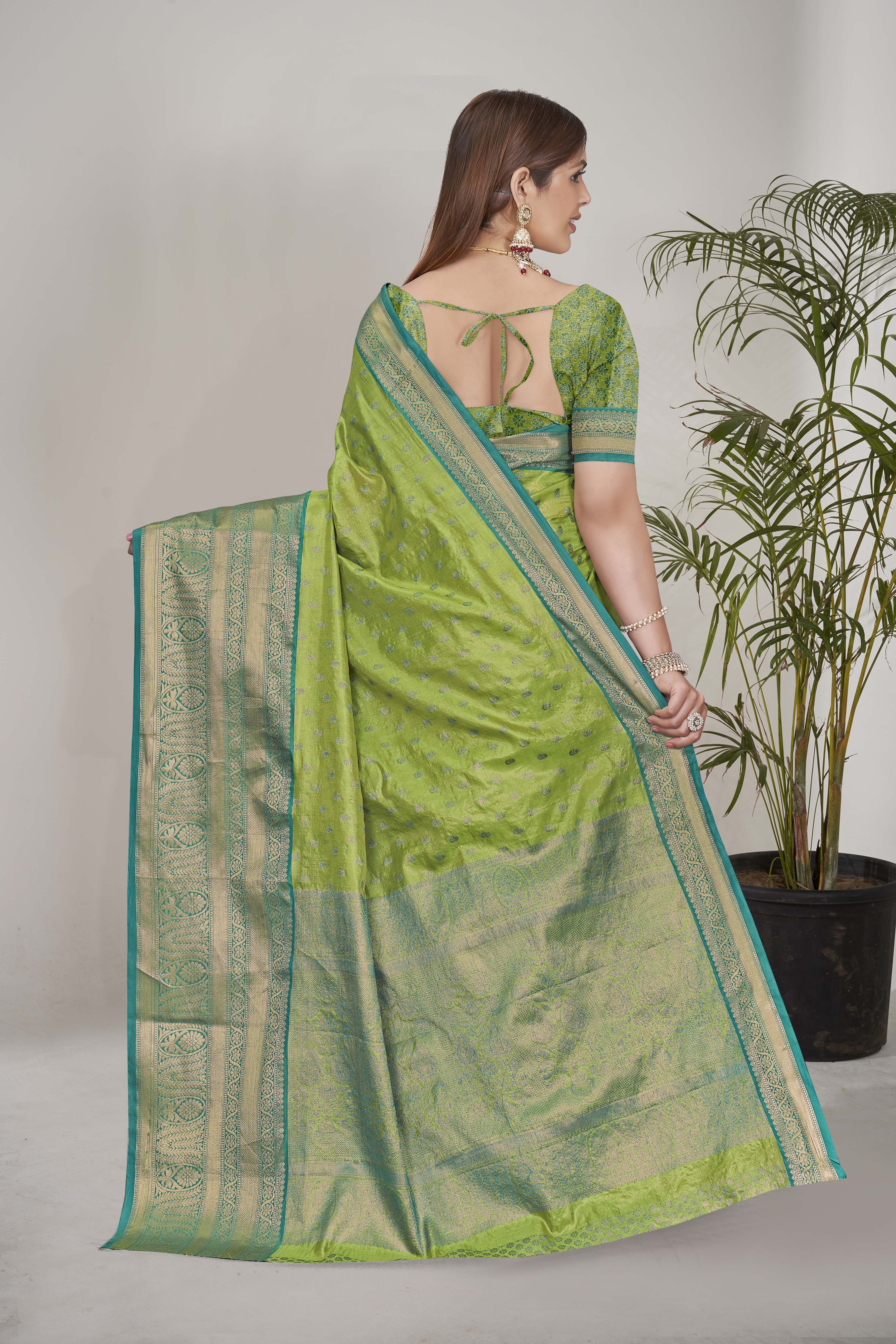 Stunning Tissue Silk Green Color Saree