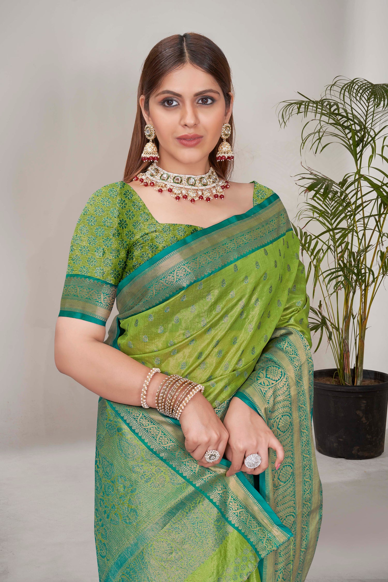 Stunning Tissue Silk Green Color Saree