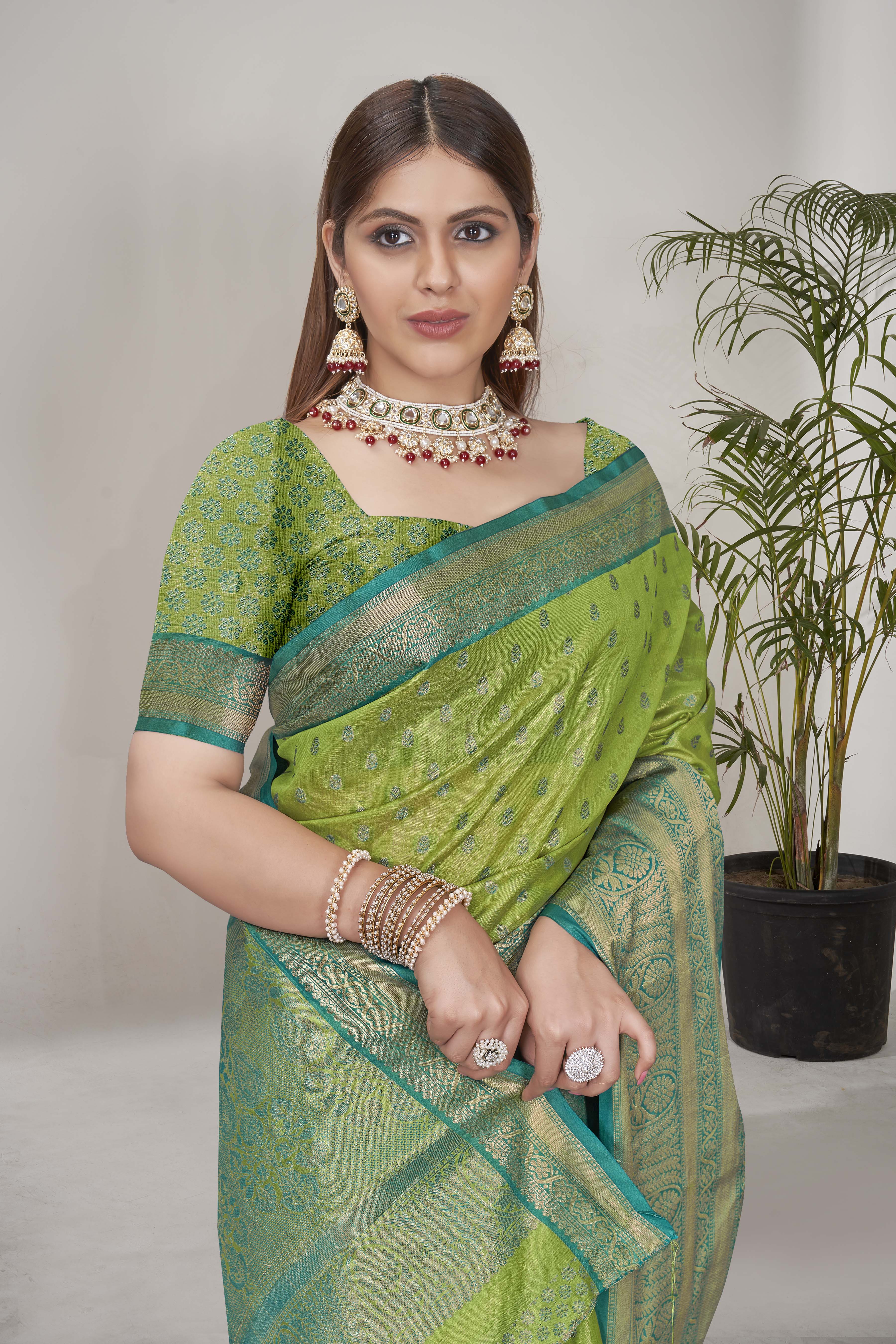 Stunning Tissue Silk Green Color Saree