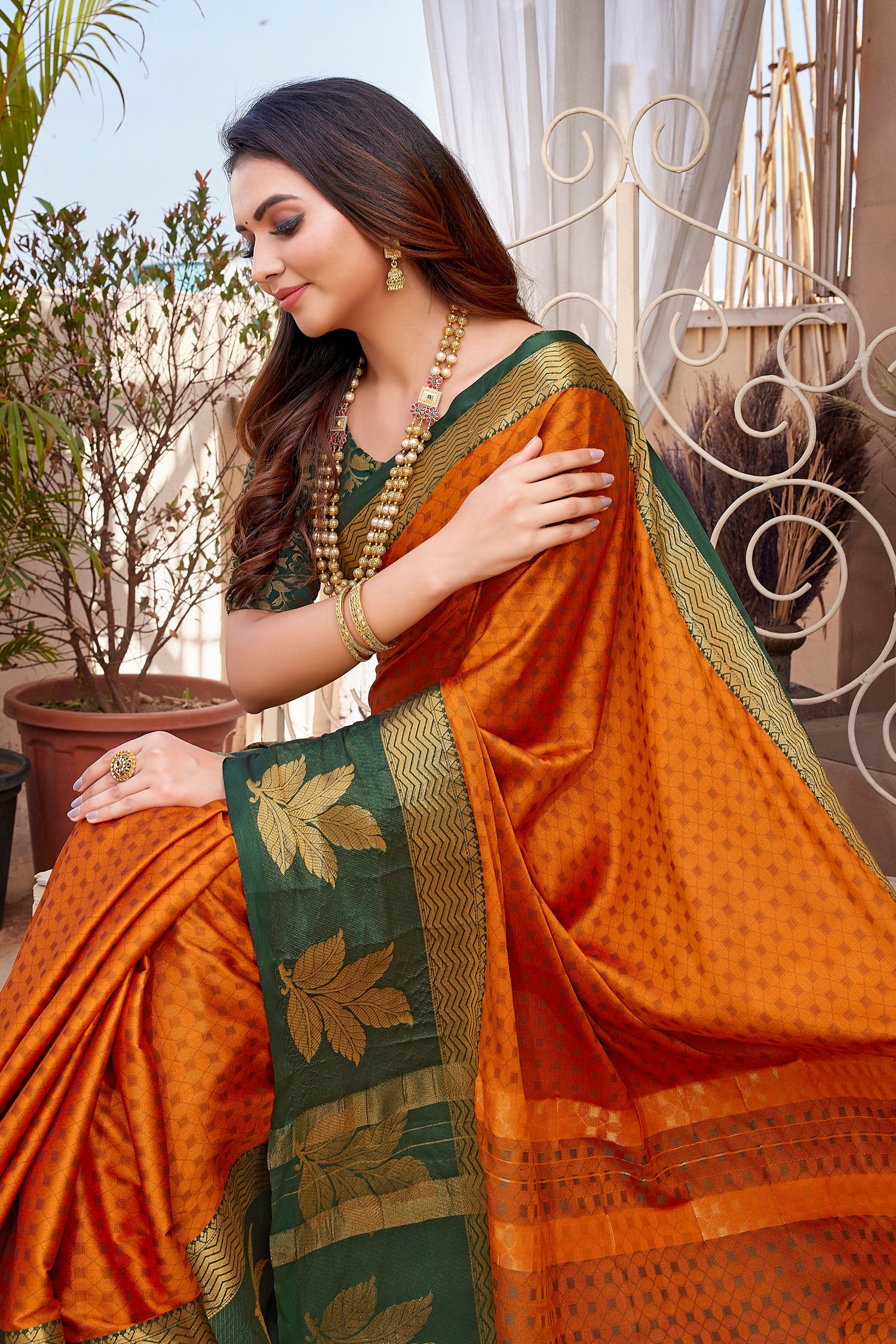 Traditional Attire Orange Color Aura Silk Saree